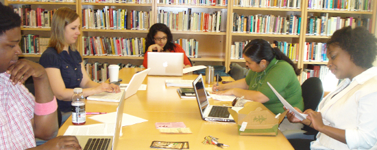 grads studying in the library