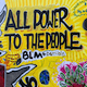 Mural reading "All Power to the People"